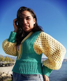 Cotton products should be preferred in order not to get cold in winter. The main reason for this is that cotton clothes exhibit a more resistant attitude to the cold. The clothes that are processed accordingly during weaving also allow the body to breathe. Women's knitwear. Coton crocheted knit v collar green-yellow blouse.  V-neck colored blouse is a size 38 (M) - 40 (L) match. I prepared it with 400 g of rope.  My ropes are Alize Cotton Gold.  You will not feel its presence on you with its light structure.  I haven't seen anyone who wants to get rid of the comfort they give you when you wear them. Measures  Arm size 51 cm  Shoulder size 37 cm  Waist size 31 cm  Body length 44 cm  There is no second of the products that I reflect my own style by working in a free pattern.  You can create Green Cotton Patchwork Sweater, Long Crochet Cardigan, Cotton Clothes, Yellow Blouse, Crochet Woman, Cotton Blouse, Knitwear Tops, Tank Top Designs, Clothing Labels