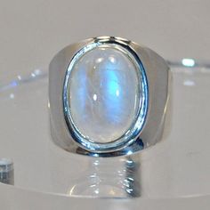 Big sterling silver ring blue moonstone | Etsy Modern Moonstone Gemstone Rings, Modern Round Moonstone Rings, Formal Moonstone Cabochon Ring, Modern Moonstone Ring With Oval Cabochon, Formal Moonstone Ring With Polished Finish, Formal Moonstone Rings With Polished Finish, Silver Cabochon Moonstone Open Ring, Silver Moonstone Cabochon Crystal Ring, White Polished Moonstone Ring