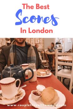 a man sitting at a table with some food on it and the words, the best scones in london