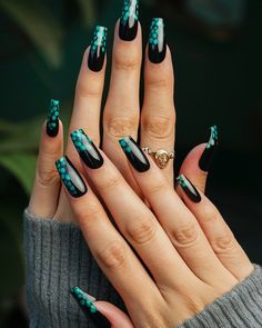 Turquoise Temptation: Elegance Meets Edge! 💎🖤 Embrace the perfect blend of bold and beautiful with these stunning turquoise and black nails! ✨💅 The striking contrast adds a touch of elegance while keeping things edgy and chic. Perfect for a night out or a stylish day at the office, these nails make a statement without saying a word! 💖🌌 Swipe for some serious inspo and let your nails do the talking! #turquoiseandblack #elegantnails #chicnailart #PrettyAndBold #nails #nailsnailsnails #art #fyp ... Matte Black And Teal Nails, Tiffany Blue And Black Nails, Dark Turquoise Nails, Nail Art Turquoise, Concert Nails