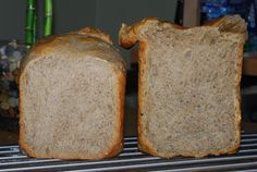 two slices of bread sitting on top of a metal rack