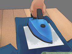 a person using a steam iron on top of a piece of paper