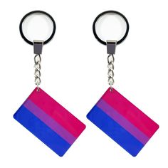 a pair of key chains with a square shaped object hanging from it's sides