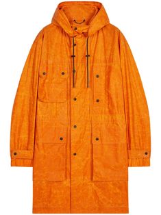 orange cotton water-repellent finish bleached effect drawstring hood multiple cargo pockets long sleeves belted cuffs straight hem mid-length Spring Utility Parka With Patch Pockets, Functional Orange Outerwear For Fall, Spring Hooded Parka With Cargo Pockets, Orange Outerwear With Drawstring Hood For Fall, Orange Drawstring Hood Outerwear For Fall, Spring Cotton Parka With Side Pockets, Hooded Utility Jacket, Versace Sneakers, City Shorts