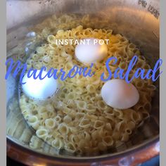 an instant pot macaroni and cheese with three eggs in it on the stove