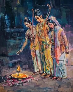 three women standing around a lit candle on the ground in front of a painting that looks like it has been painted