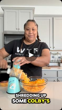 a woman in a black shirt is making some colesly's macaroni and cheese