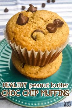 two chocolate chip muffins sitting on top of a green plate with the words healthy peanut butter choc chip muffins