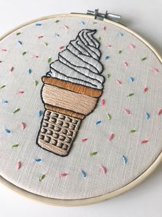 an embroidery project with ice cream and sprinkles