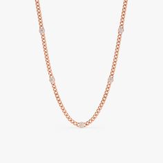 minimalist solid 14k rose gold cuban chain necklace with five diamond bezels Classic Rose Gold Chain Necklace, Classic Rose Gold Link Chain Necklace, Elegant Rose Gold Cable Chain Necklaces, Elegant Rose Gold Necklace With Cable Chain, Elegant Diamond Oval Link Chain Necklace, Elegant Oval Link Diamond Chain Necklace, Timeless Diamond Chain Necklace With Delicate Chain, Elegant 14k Rose Gold Chain Necklace, Rose Gold Oval Link Timeless Necklace