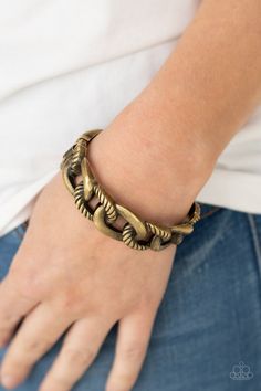 Featuring plain and textured finishes, chunky brass links interconnect into an edgy bangle-like cuff. Features a hinged closure. Sold as one individual bracelet. Live Text, Pink Jewels, Purple Bracelet, Snap Bracelets, Brass Bracelet, Hinged Bracelet, Textured Design, Paparazzi Accessories, Dainty Bracelets