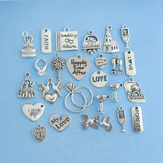 many different types of charms on a blue background