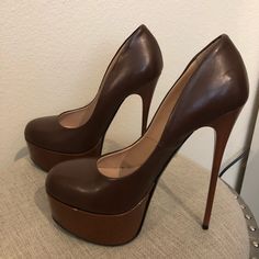 Brown Leather Heels With A Brown Plastic Platform. Made In Italy Used Once Comes With Dust Bag And Replacement Heel Tips Heel: 6 Inc Platform: 2 Inc Size 7 (37) Brown Platform High Heels, Brown Platform Heels For Night Out, Brown Platform Heels For A Night Out, Brown Heels With Deep Heel Cup For Evening, Brown Almond Toe Platform Heels, Brown Closed Toe Heels With Contrasting Heel Counter, Brown Closed-toe Heels With Contrasting Heel Counter, Brown Heels With Padded Heel For Night Out, Brown High Heel Evening Heels