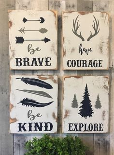 three wooden signs that say brave, brave and be kind to each other on a wall