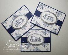 three cards with snowflakes on them and merry christmas written across the front in white ink