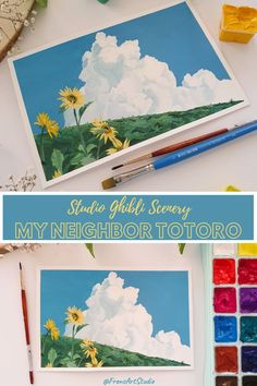 an art project with sunflowers and clouds in the sky, on top of a table