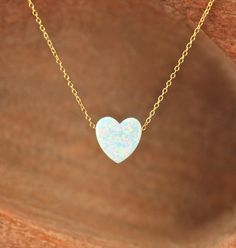 Opal heart necklace - love necklace - valentines necklace - gold heart necklace - silver heart necklace A stunning opal heart hanging happily from a 16 inch 14k gold vermeil chain. Please feel free to select a different length chain if you prefer! Also available on a sterling silver Dainty White Heart Necklace For Her, 14k Gold Filled Necklaces For Valentine's Day Anniversary, Dainty White Heart-shaped Necklace, Dainty 14k Gold Open Heart Necklace, White Heart-shaped Necklace As A Gift For Her, Heart-shaped 14k Gold Filled Necklace Gift, 14k Gold-filled Heart Necklace With Heart Charm, Heart-shaped Yellow Gold Charm Necklace In Sterling Silver, White Heart Shaped Necklace For Her