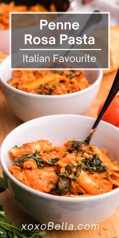 two white bowls filled with pasta and spinach