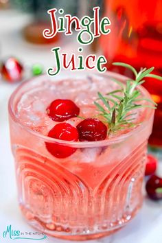 a drink with cranberry juice and rosemary garnish