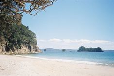 the beach is clean and ready for us to enjoy it's sunny day at the water's edge