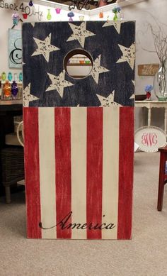 an american flag made out of wood sitting on top of a table