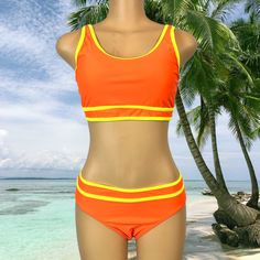 New Without Tags Women’s 2 Piece Bikini Swimsuit - Size Medium - Orange And Yellow - Pullover Tank Style Bikini Top With Adjustable Straps And Removable Bra Pads - Cheeky Bikini Briefs Bottoms - Stretchy Poly Mode And Elastane Fabric Fast Shipping From A Smoke Free Environment Sleeveless Color Block Swimwear For Beach Season, Sleeveless Color Block Swimwear For Beach, Stretch Color Block Sleeveless Swimwear, Stretch Sleeveless Color Block Swimwear, Sleeveless Stretch Color Block Swimwear, Sleeveless Color Block Stretch Swimwear, Color Block Stretch Swimwear For Beach Season, Stretch Color Block Swimwear For Beach Season, Casual One-piece Color Block Swimwear