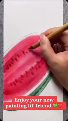 someone is drawing watermelon slices with a pencil