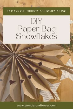 paper bag snowflakes with the title 12 days of christmas homemaking diy paper bag snowflakes