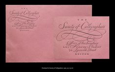 two pink envelopes with calligraphy on them