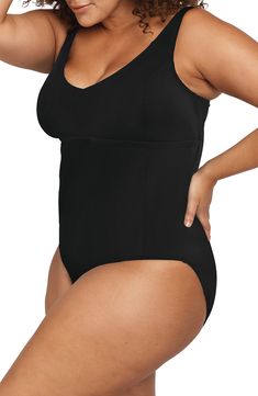 A high neckline, strong back clip and side panels bring body-shaping comfort to this pool-worthy swimsuit made of chlorine-resistant fabric. Scoop neck Multifit soft foam cups are suitable for sizes C - DD cup Lined 52% PBT polyester, 48% polyester Hand wash, dry flat Imported Solid Second-skin Shapewear For Swimming, Black Second-skin Full Coverage Swimwear, Second-skin Full Coverage Bodysuit For Swimming, Sculpting Nylon Bodysuit For Swimming, Black Second-skin Swimwear With Solid Back, Black Sculpting Swimwear For Swimming, Full Coverage Swimwear With Built-in Padding For Swimming, Shaping Swimwear For Swimming, Full Coverage Swimwear With Built-in Padding