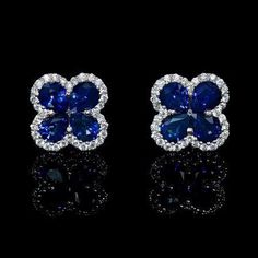 METAL SPECIFICATIONS Metal Name: White Gold 14K STONE SPECIFICATIONS Stone Name: SAPPHIRE/DIAMOND Stone Cut : Pear and Round cut Stone Specifications: There are 8 blue sapphires approx. 0.50 carats each (approx. size 6x4 mm) and 66 round diamonds approx. 0.01 carats each (approx. dia 1.12 mm). Natural earth-mined stones. Total Stone Weight : approx. 4.66 carats Color : Blue/F Clarity : AAA/VVS1 APPRAISAL Appraised Value : $7398.00 Comes with Certificate Cluster Earring, Diamond Pendants Designs, Diamond Earrings Studs Round, Diamond Cluster Earrings, Jeweled Earrings, Jewelry Accessories Ideas, Halo Earrings Studs, Buying Diamonds, Sapphire Earrings