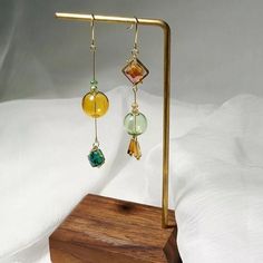 Glass Earrings New 2020 Trend! Beautiful Brown And Green Colors Earrings Are Asymmetrical. One 3 Inches Length, Other 2.6 Inches. Real Glass Beads Lightweight! Tags: Zara Top Shop Asos Mango Trendy Stylish Bubble Earrings, Glass Sphere, Glass Drop Earrings, Contemporary Earrings, Classic Earrings, Long Drop Earrings, Long Dangle Earrings, Colorful Earrings, Vanity Table