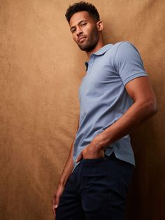 ORGANIC PIQUE: Our signature pique polo fabric, now made with 100% organic cotton.  Polo collar with button placket.  Straight hem with vented sides.  Slim fit.  Short sleeves.  Hits at the hip.  Body length (size M): Regular 28", Tall 29. 5" Sleeve length: Regular 17. 5", Tall 18. 25" Model: Size M, 6'2" (188cm). Relaxed Fit Cotton Polo T-shirt, Solid Button-up Polo Shirt With Placket, Solid Relaxed Fit Polo T-shirt, Classic Cotton Polo Collar T-shirt, Cotton Golf Polo Shirt With 4-way Stretch, Pique Polo Shirt, Polo Collar, Banana Republic, Men's Polo Shirt