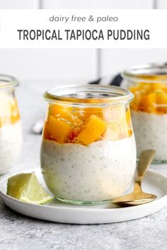 three jars filled with tropical pudding on top of a white plate