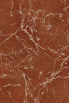 a brown marble textured surface with white streaks