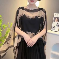 Black Chiffon Short Sleeve Blouse, Elegant Short Sleeve Chiffon Tops, Sheer Chiffon Party Top, Elegant Black Chiffon Top, Elegant Party Tops In Georgette, Sleeveless Chiffon Blouse For Party, Evening Sheer Chiffon Top, Elegant Black Georgette Blouse, Elegant Black Chiffon Blouse