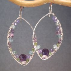 Peridot, tanzanite, apatite, and amethyst wrapped onto hammered marquise shapes, about 2-3/4.   Available in 14k gold filled & sterling silver, Stone Wrapping, Beading Ideas, Wrapped Jewelry, Wire Earrings, Bead Earrings, Vintage Bracelets, Wire Wrapped Jewelry, Beaded Earrings, Wire Wrapped