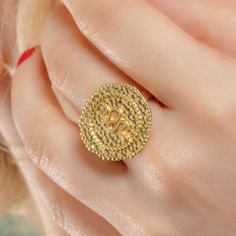 Our Embossed Snake Coin Ring embodies the essence of shedding the old and embracing growth, symbolizing a journey toward wholeness and renewal. The intricately detailed snake in a serpentine pattern, embossed on a coin, represents continuous movement and transformation. The petite adjustable band, hammered texture, and delicate metal ball threading around the coin base, not only enhance its unique design but also add profound symbolic significance to the piece. Symbolic Adjustable Engraved Snake Ring, Adjustable Engraved Symbolic Snake Ring, Symbolic Engraved Adjustable Snake Ring, Symbolic Adjustable Snake Ring For Anniversary, Adjustable Gold Snake Ring Symbolic, Adjustable Gold Symbolic Snake Ring, Chain Lock, Artisan Gift, Zodiac Gifts