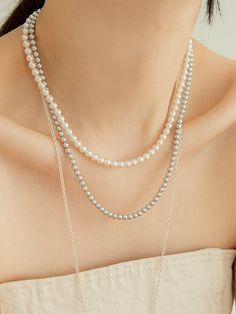 Editor's NotesJewelry collection from LUNNE will flatter any look gracefully.- Classic strands of pearl necklace- Two-way worn as a single or double layer- Luxurious and elegant- Minimal and chic- High quality textureMeasurement (in.)- 0.2 in. D White Pearl / 15.8 in. Length- 0.16 in. D Grey Pearl/ 16.1 in. LengthComposition & Care- 925 Silver/ Swarovski Pearl- Avoid direct heat and moisture- Wipe with a dry clothDesigner- by LUNNE Grey Pearl Necklace, D Gray, Swarovski Pearls, Pearl Grey, White Pearl, Pearl White, Double Layer, Pearl Necklace, 925 Silver