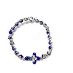 "Blessed small beads - Blue Cloisonne ' Bracelet - Blessed by Pope Francis This is a special item, blessed by Papa Francesco (Pope Francis) during public blessing in St. Peter square. It can be blessed again after the sale if requested. Just ask me! Comes with a parchment paper COA blessing. This is a stretch on bracelet. Diameter at which naturally rests: 2.5\" This version has the smaller beads. Adjusts to any woman wrist size. It's really fine and classy. This model is really beautiful and a Cloisonne Bracelet, Catholic Bracelet, Vintage Holy Cards, Italian Bracelet, Vitreous Enamel, Catholic Jewelry, Small Beads, St Peter, Be Blessed