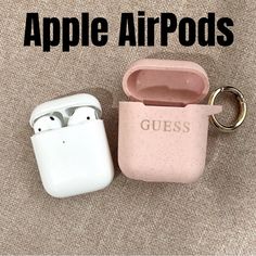 two airpods sitting next to each other with the words guess on them in black and white