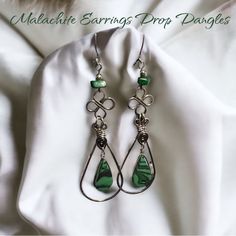 Malachite Green Gemstone Drop Dangle Earrings. 3/4 Inch Wide At The Base. And 2/1/2 Inches Long Dangle. Great To Pair With Malachite Pendant Also Listed In Closet. Genuine Gemstone Malachite Two Stones On Each Earring. Sterling Silver Styled Swirls Holds Elegance And Beauty To The Wearer. Malachite Has Swirls Of Greens Spiritual Properties Enhance Immune System, Assists In Growing Emotionally & Mentally & Spiritually. Fortifies Observational Skills, Assists You To Recognize And Use Your Power. B Malachite Green, Malachite Earrings, Diy Jewlery, Malachite Pendant, Drop Dangle Earrings, Green Gemstones, Sterling Earrings, Immune System, Silver Fashion