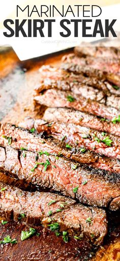 sliced steak on a wooden cutting board with parsley garnish and text overlay that reads marinated skirt steak