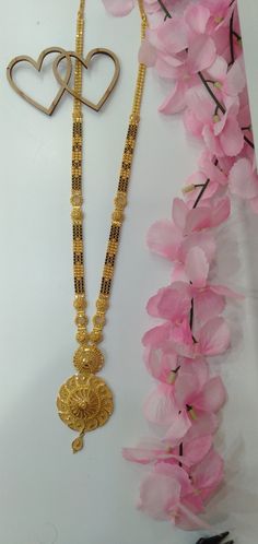 Fancy Long Mangalsutra Designs Gold, Mangalsutra Designs Long Indian Bridal, Gold Mangalsutra Designs Bridal, Gold Jewels Design Long Necklace, Nallapusalu Long Chain Designs, Long Nallapusalu Designs Gold, Mangalsutra Designs Gold Long, Long Gold Mangalsutra Designs