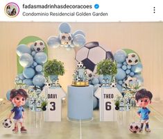 an image of a birthday party with balloons and soccer themed decorations on the wall behind it