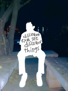 a person sitting on a bench with the words different exes see different things written on it