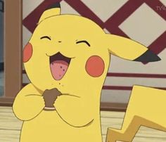 a pikachu with its mouth open and tongue out