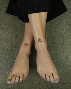 a woman with two small tattoos on her feet