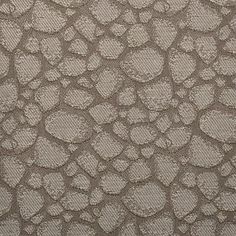 an upholstered fabric pattern with small circles in grey and beige colors on a white background