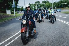 a group of motorcyclists riding down the road on their bikes and motorcycles